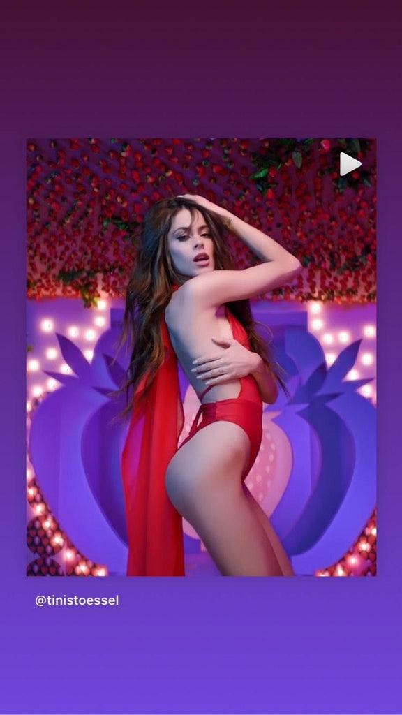 Tini Stoessel wearing a Stello Red Bodysuit in her Music Video